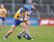 15 February 2009; Jack Kennedy, Waterford, in action against Gerry O'Grady, Clare. Allianz National Hurling League, Division 1, Round 2, Clare v Waterford, Cusack Park, Ennis, Co. Clare. Picture credit: Pat Murphy / SPORTSFILE
