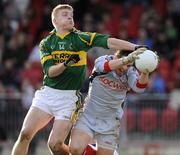 15 February 2009; Tommy Walsh, Kerry, in action against Jonathan Curran, Tyrone. Allianz National Football League, Division 1, Round 2, Tyrone v Kerry, Healy Park, Omagh, Co. Tyrone. Picture credit: Oliver McVeigh / SPORTSFILE