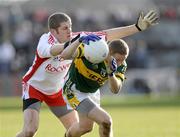 15 February 2009; Colm Cooper, Kerry, in action against Kevin Hughes, Tyrone. Allianz National Football League, Division 1, Round 2, Tyrone v Kerry, Healy Park, Omagh, Co. Tyrone. Picture credit: Oliver McVeigh / SPORTSFILE