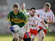 15 February 2009; Colm Cooper, Kerry, in action against Ryan McMenamin, Tyrone. Allianz National Football League, Division 1, Round 2, Tyrone v Kerry, Healy Park, Omagh, Co. Tyrone. Picture credit: Oliver McVeigh / SPORTSFILE