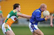 15 February 2009; Padraig Berry, Longford, in action against Conor Carroll, Offaly. Allianz National Football League, Division 3, Round 2, Offaly v Longford, O'Connor Park, Tullamore, Co. Offaly. Picture credit: Brian Lawless / SPORTSFILE