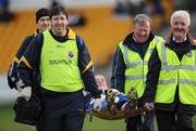15 February 2009; Longford's Colm Flynn manages a smile as he's stretchered from the pitch. Allianz National Football League, Division 3, Round 2, Offaly v Longford, O'Connor Park, Tullamore, Co. Offaly. Picture credit: Brian Lawless / SPORTSFILE