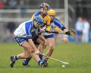 15 February 2009; Alan Markham, Clare, in action against Michael Walsh, left, and James Murray, Waterford. Allianz National Hurling League, Division 1, Round 2, Clare v Waterford, Cusack Park, Ennis, Co. Clare. Picture credit: Pat Murphy / SPORTSFILE