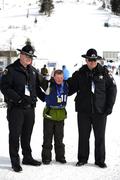 14 February 2009; Ben Purcell, TEAM Ireland, sponsored by eircom, from Dalkey, Co. Dublin, who won a Gold medal in the Novice Grade Giant Slalom Event at the Boise-Bogus Basin Mountain Recreation Area with Deputy Tyler Jussel, left, and Sgt. Meldon Kelley of the Idaho State Police. 2009 Special Olympics World Winter Games, Boise, Idaho, USA. Picture credit: Ray McManus / SPORTSFILE