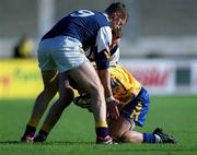 14 October 2000; Mick Galvin of Na Fianna in action against Darren Magee, left, and John O'Callaghan of Kilmacud Crokes during the Evening Herald Dublin Senior Football Championship Final match between Na Fianna and Kilmacud Crokes at Parnell Park in Dublin. Photo by Brendan Moran/Sportsfile