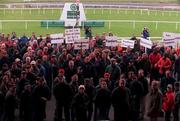 17 October 2000; A demonstration was held at The Curragh Racecourse today to highlight the fact that the Turf Club stands in the way of securing the future for racing. Attendees included stable and stud employees, trainers, jockeys, owners, breeders, farriers and racecourse representatives. Pictured are attendees during the protest at The Curragh Racecourse in Kildare. Photo by Damien Eagers/Sportsfile
