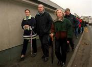 17 October 2000; A demonstration was held at The Curragh Racecourse today to highlight the fact that the Turf Club stands in the way of securing the future for racing. Attendees included stable and stud employees, trainers, jockeys, owners, breeders, farriers and racecourse representatives. Pictured is trainer Dermot Weld, centre, during the protest at The Curragh Racecourse in Kildare. Photo by Damien Eagers/Sportsfile