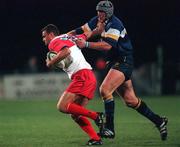 13 October 2000; Laurent Mazas of Biarritz is tackled by Malcolm O'Kelly of Leinster during the Heineken Cup Pool 1 match between Leinster and Biarritz at Donnybrook Stadium in Dublin. Photo by Damien Eagers/Sportsfile
