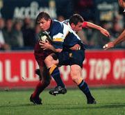 13 October 2000; Brian O'Driscoll of Leinster is tackled by Sebastien Bonetti of Biarritz during the Heineken Cup Pool 1 match between Leinster and Biarritz at Donnybrook Stadium in Dublin. Photo by Brendan Moran/Sportsfile