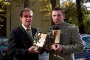 18 October 2000; Kilkenny hurler DJ Carey, left, and Kerry footballer Seamus Moynihan are pictured with their Eircell GAA Player of the Month awards for Ocotber, at the Burlington Hotel in Dublin. Photo by Ray McManus/Sportsfile