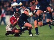 13 October 2000; Victor Costello of Leinster is tackled by Christophe Milheres of Biarritz during the Heineken Cup Pool 1 match between Leinster and Biarritz at Donnybrook Stadium in Dublin. Photo by Brendan Moran/Sportsfile