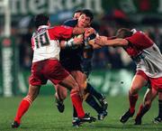 13 October 2000; Shane Horgan of Leinster is tackled by Laurent Mazas, left, and Christophe Milheres of Biarritz during the Heineken Cup Pool 1 match between Leinster and Biarritz at Donnybrook Stadium in Dublin. Photo by Brendan Moran/Sportsfile