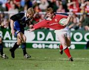 21 October 2000; Anthony Horgan of Munster is tackled by Iain Balshaw of Bath during the Heineken Cup Pool 4 match between Munster and Bath at Thomond Park in Limerick. Photo by Brendan Moran/Sportsfile
