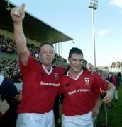 21 October 2000; Mick Galwey, left, and David Wallace of Munster following their side's victory during the Heineken Cup Pool 4 match between Munster and Bath at Thomond Park in Limerick. Photo by Brendan Moran/Sportsfile