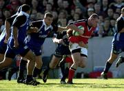 21 October 2000; Frank Sheahan of Munster evades the tackles of several Bath players during the Heineken Cup Pool 4 match between Munster and Bath at Thomond Park in Limerick. Photo by Brendan Moran/Sportsfile