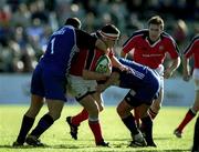 21 October 2000; Anthony Foley of Munster is tackled by David Barnes of Bath during the Heineken Cup Pool 4 match between Munster and Bath at Thomond Park in Limerick. Photo by Brendan Moran/Sportsfile