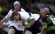 21 October 2000; Brian O'Driscoll of Leinster is tackled by Alastair Hepher and Simon Webster of Northampton Saints during the Heineken Cup Pool 1 match between Northampton Saints and Leinster at Franklin's Gardens in Northampton, England. Photo by Matt Browne/Sportsfile