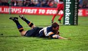 13 October 2000; Gordon D'Arcy of Leinster dives over to score a try during the Heineken Cup Pool 1 match between Leinster and Biarritz at Donnybrook Stadium in Dublin. Photo by Brendan Moran/Sportsfile