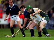 15 October 2000; Michael Collins of Ireland during the Hurling Shinty International match between Ireland and Scotland at Croke Park in Dublin. Photo by Brendan Moran/Sportsfile