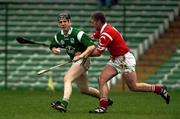 22 October 2000; James Horan of Limerick in action against Pat Sexton of Cork during the Waterford Crystal South East Hurling League match between Limerick and Cork at Gaelic Grounds in Limerick. Photo by Damien Eagers/Sportsfile