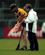 22 October 2000; Frank Lohan of Clare dries his hands with a towel during the Waterford Crystal South East Hurling League match between Clare and Tipperary at Cusack Park in Ennis, Clare. Photo by Brendan Moran/Sportsfile