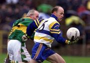 22 October 2000; Peter Canavan of Errigal Ciarán in action against  Emmet Brennan of Castleblayney during the Ulster GAA Football Senior Club Championship Semi-Final match between Castleblayney and Errigal Ciarán at St Tiernach's Park in Clones, Monaghan. Photo by Ray McManus/Sportsfile