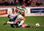 22 October 2000; Tony Grant of Shamrock Rovers in action against Robert McAuley of UCD during the Eircom League Premier Division match between UCD and Shamrock Rovers at Belfield Park in Dublin. Photo by Ray Lohan/Sportsfile