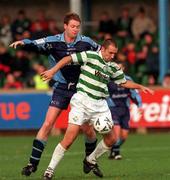 22 October 2000; Tony Grant of Shamrock Rovers in action against Tony McDonnell of UCD during the Eircom League Premier Division match between UCD and Shamrock Rovers at Belfield Park in Dublin. Photo by Ray Lohan/Sportsfile
