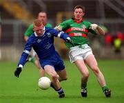 22 October 2000; Fergal Doherty of Bellaghy in action against Gerald Pearson of Gowna during the Ulster GAA Football Senior Club Championship Semi-Final match between Bellaghy and Gowna at St Tiernach's Park in Clones, Monaghan. Photo by Ray McManus/Sportsfile
