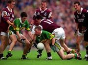7 October 2000; Tomás Ó Sé of Kerry, supported by team-mate Aodan MacGearailt, left, in action against Padraic Joyce, centre, Michael Donnellan and Seán Óg De Paor of Galway during the Bank of Ireland All-Ireland Senior Football Championship Final Replay match between Kerry and Galway at Croke Park in Dublin. Photo by Ray McManus/Sportsfile