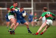 22 October 2000; Louis McPeake of Bellaghy, centre, in action against Fergal Hartin and Bernard Sorahan of Gowna during the Ulster GAA Football Senior Club Championship Semi-Final match between Bellaghy and Gowna at St Tiernach's Park in Clones, Monaghan. Photo by Ray McManus/Sportsfile