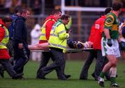 22 October 2000; Enda McGinley of Errigal Ciarán is stretchered from the field following and injury during the Ulster GAA Football Senior Club Championship Semi-Final match between Castleblayney and Errigal Ciarán at St Tiernach's Park in Clones, Monaghan. Photo by Ray McManus/Sportsfile