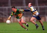 22 October 2000; Ray McArdle of Castleblayney in action against Peter Canavan of Errigal Ciarán during the Ulster GAA Football Senior Club Championship Semi-Final match between Castleblayney and Errigal Ciarán at St Tiernach's Park in Clones, Monaghan. Photo by Ray McManus/Sportsfile