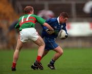 22 October 2000; Louis McPeake of Bellaghy in action against Bernard Sorahan of Gowna during the Ulster GAA Football Senior Club Championship Semi-Final match between Bellaghy and Gowna at St Tiernach's Park in Clones, Monaghan. Photo by Ray McManus/Sportsfile