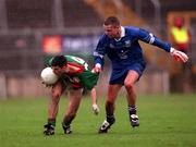 22 October 2000; Cathaldus Hartin of Gowna, left, in action during the Ulster GAA Football Senior Club Championship Semi-Final match between Bellaghy and Gowna at St Tiernach's Park in Clones, Monaghan. Photo by Ray McManus/Sportsfile