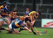 22 October 2000; Gordan Malone of Clare in action against Eamonn Corcoran of Tipperary during the Waterford Crystal South East Hurling League match between Clare and Tipperary at Cusack Park in Ennis, Clare. Photo by Brendan Moran/Sportsfile