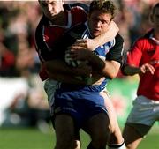 21 October 2000; Phil de Glanville of Bath in action against David Wallace of Munster during the Heineken Cup Pool 4 match between Munster and Bath at Thomond Park in Limerick. Photo by Damien Eagers/Sportsfile