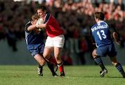 21 October 2000; Jason Holland of Munster breaks through the Bath defence during the Heineken Cup Pool 4 match between Munster and Bath at Thomond Park in Limerick. Photo by Brendan Moran/Sportsfile