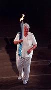 15 September 2000; Former Australian Olympic Gold Medallist Dawn Fraser with the Olympic Torch during the Opening Ceremony of the XXVII Olympic Games at Stadium Australia in the Sydney Olympic Park, Homebush Bay, Sydney, Australia. Photo by Brendan Moran/Sportsfile