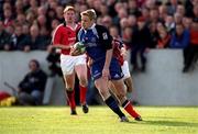 21 October 2000; Iain Balshaw of Bath is tackled by Dominic Crotty of Munster during the Heineken Cup Pool 4 match between Munster and Bath at Thomond Park in Limerick. Photo by Brendan Moran/Sportsfile