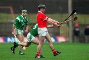 22 October 2000; Mark Landers of Cork in action against Peter Lawlor of Limerick during the Waterford Crystal South East Hurling League match between Limerick and Cork at Gaelic Grounds in Limerick. Photo by Damien Eagers/Sportsfile