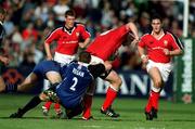 21 October 2000; Anthony Foley of Munster in action against Martin Regan of Bath during the Heineken Cup Pool 4 match between Munster and Bath at Thomond Park in Limerick. Photo by Brendan Moran/Sportsfile