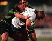 27 October 2000; Victor Costello of Leinster is tackled by Steve Thompson of Northampton Saints during the Heineken Cup Pool 1 match between Leinster and Northampton Saints at Donnybrook Stadium in Dublin. Photo by Brendan Moran/Sportsfile
