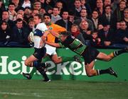 27 October 2000; Denis Hickie of Leinster is tackled by Ben Cohen of Northampton Saints during the Heineken Cup Pool 1 match between Leinster and Northampton Saints at Donnybrook Stadium in Dublin. Photo by Brendan Moran/Sportsfile