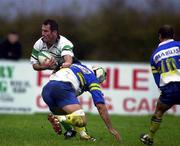 28 October 2000; Eric Elwood of Connacht is tackled by Jermoe Thion of AS Montferrand during the European Rugby Challenge Cup match between Connacht and AS Montferrand at Ericsson Park in Athlone, Westmeath. Photo by Damien Eagers/Sportsfile