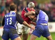 28 October 2000; Alan Quinlan of Munster is tackled by Angus Gardiner,r right, and Phil de Glanville of Bath during the Heineken European Cup Pool 4 Round 4 match between Bath and Munster at the Recreation Ground in Bath, England. Photo by Matt Browne/Sportsfile