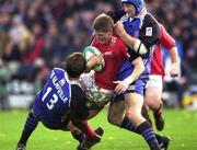 28 October 2000; Ronan O'Gara of Munster is tackled by Phil de Glanville, left, and Steve Borthwick of Bath during the Heineken European Cup Pool 4 Round 4 match between Bath and Munster at the Recreation Ground in Bath, England. Photo by Matt Browne/Sportsfile