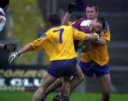 29 October 2000; Noel Meehan of Galway in action against Paul Noone, left, and Donal Casserly of Roscommon during the Church & General National Football League Division 1A match between Roscommon and Galway at Dr Hyde Park in Roscommon. Photo by Damien Eagers/Sportsfile