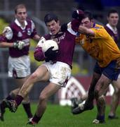 29 October 2000; Derry O'Brien of Galway in action against Donal Casserly of Roscommon during the Church & General National Football League Division 1A match between Roscommon and Galway at Dr Hyde Park in Roscommon. Photo by Damien Eagers/Sportsfile