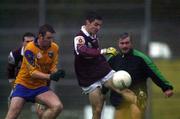 29 October 2000; Noel Meehan of Galway in action against Donal Casserly of Roscommon during the Church & General National Football League Division 1A match between Roscommon and Galway at Dr Hyde Park in Roscommon. Photo by Damien Eagers/Sportsfile